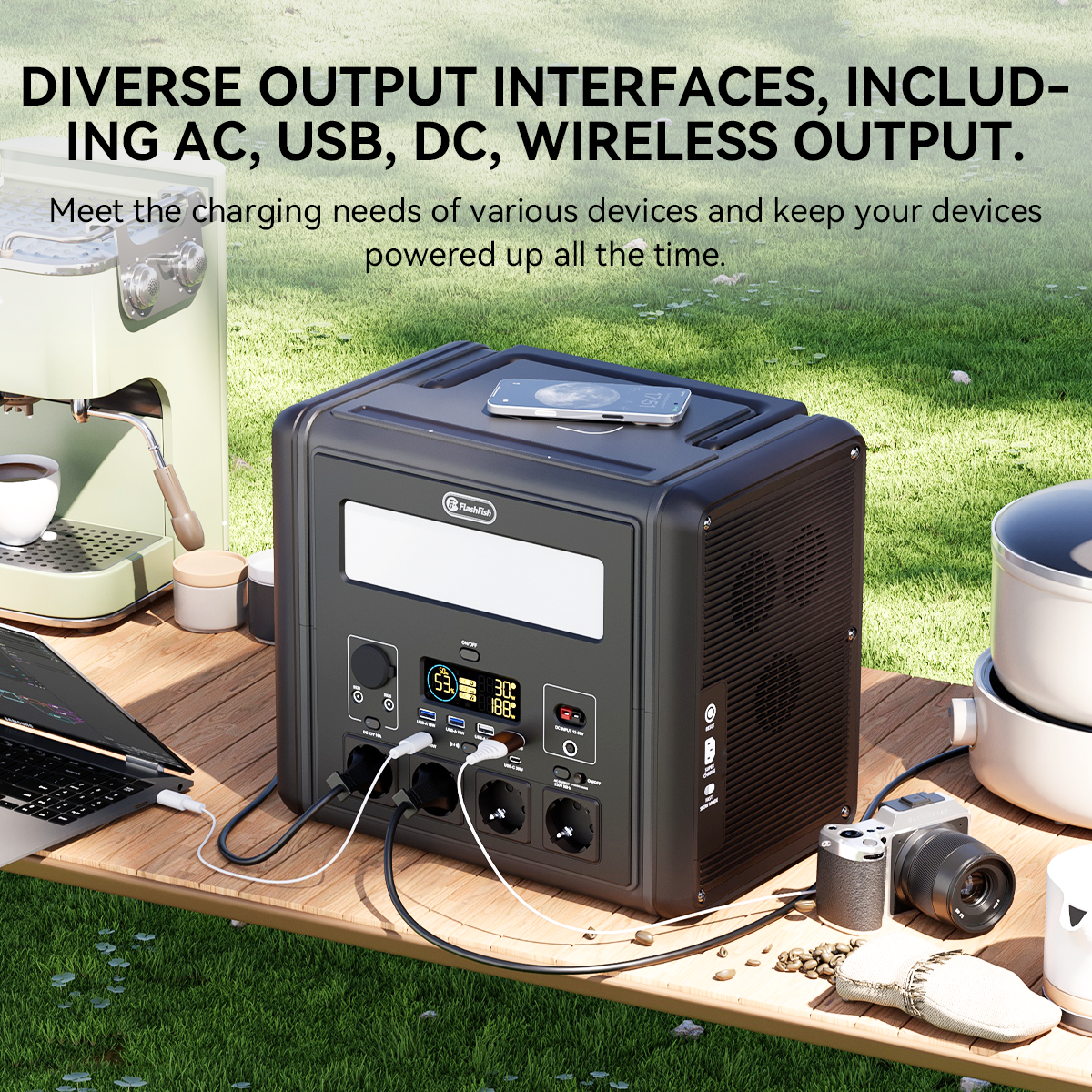 FlashFish T2000 power station powering devices at an outdoor table