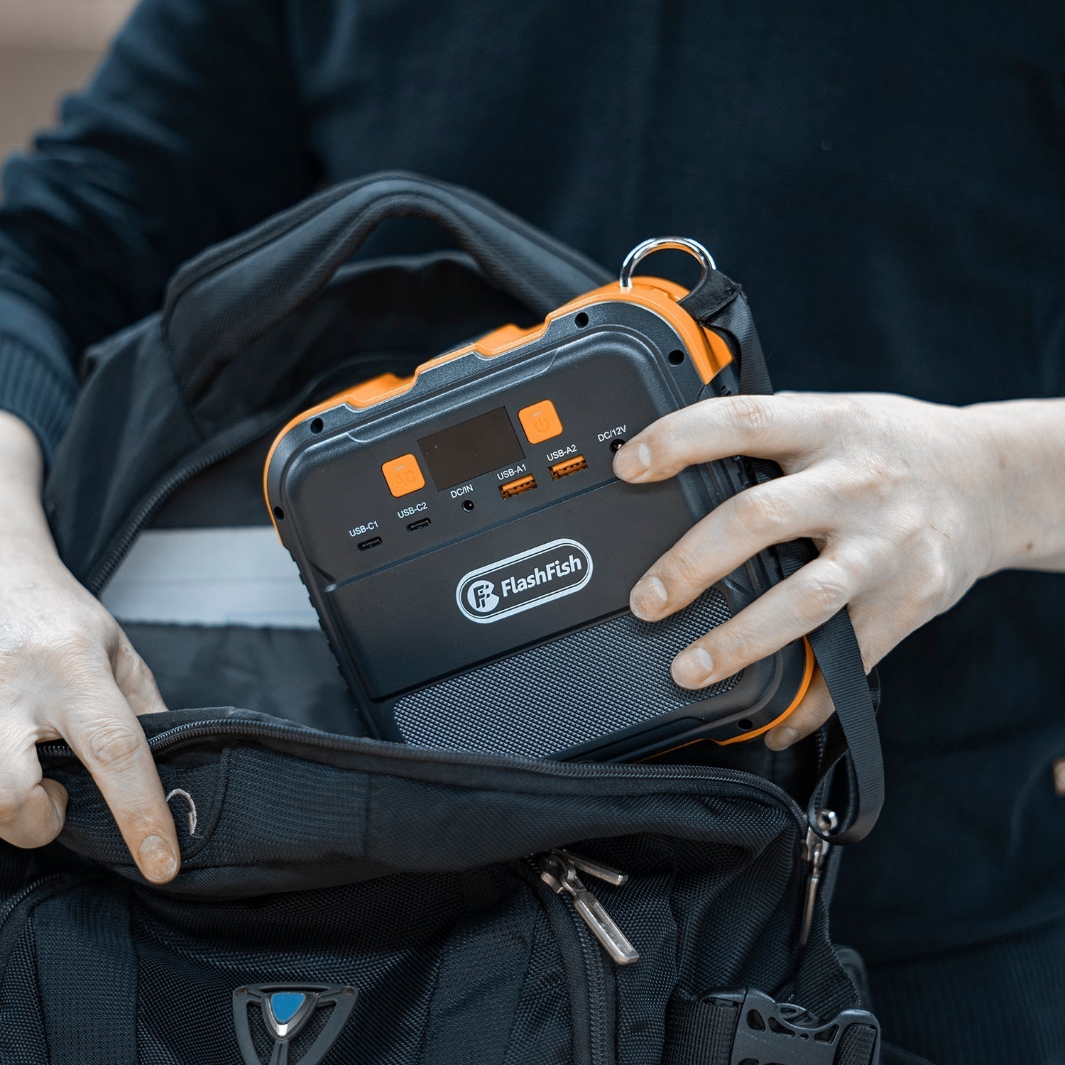 FlashFish A101 portable power station packed for travel