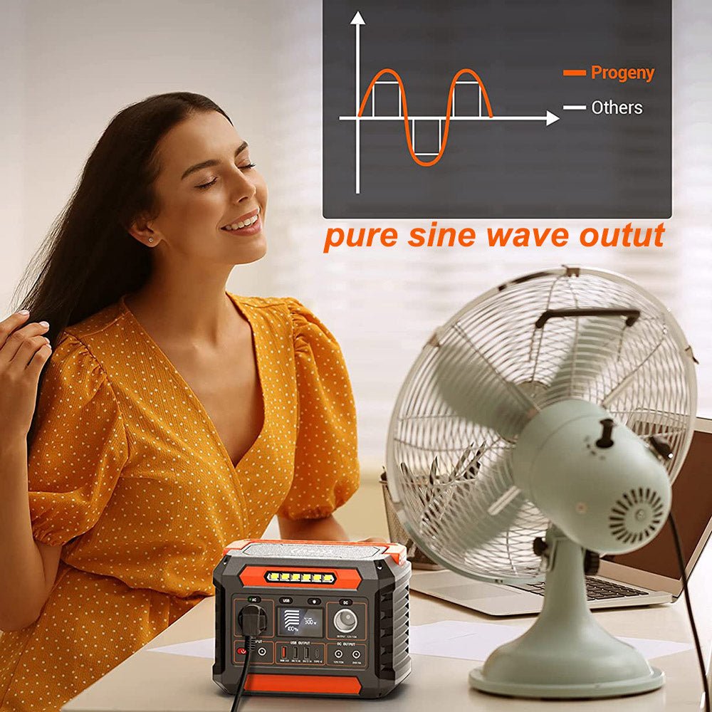 FlashFish compact power station powering a small fan for summer backup planning